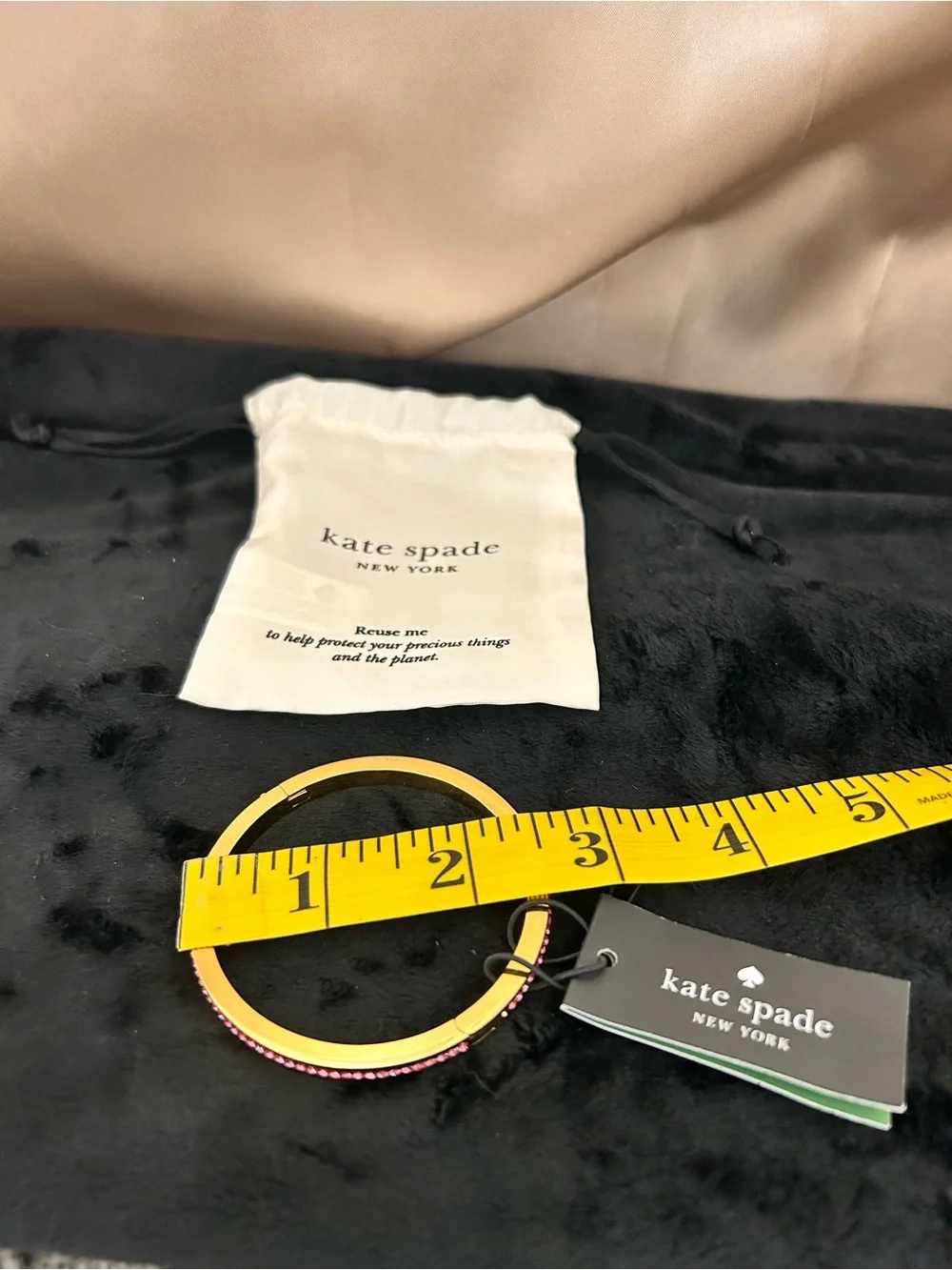 kate spade Gold Tone Hinged Bangle with Pink Crystals